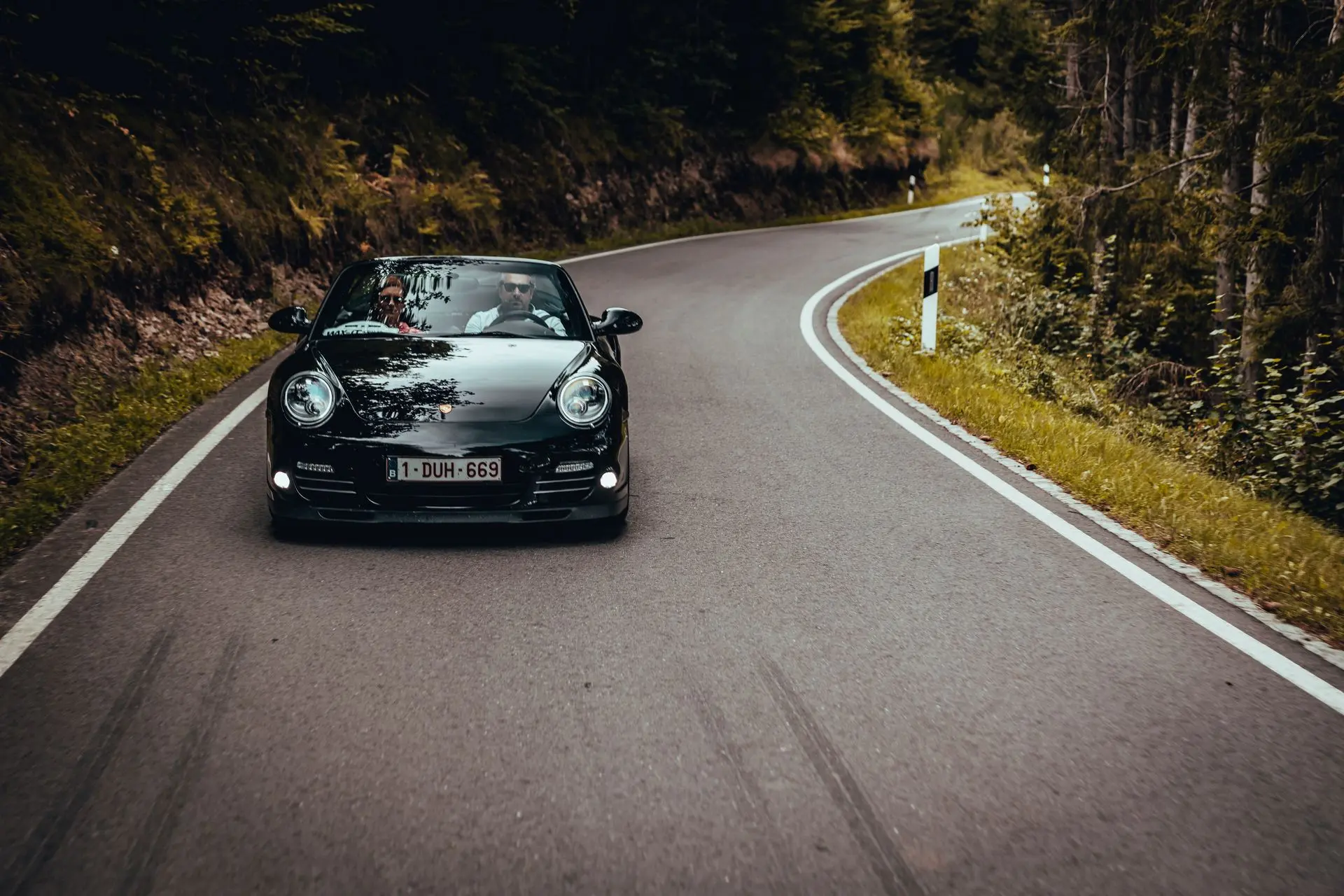 1DUH669 Black Porsche convertible