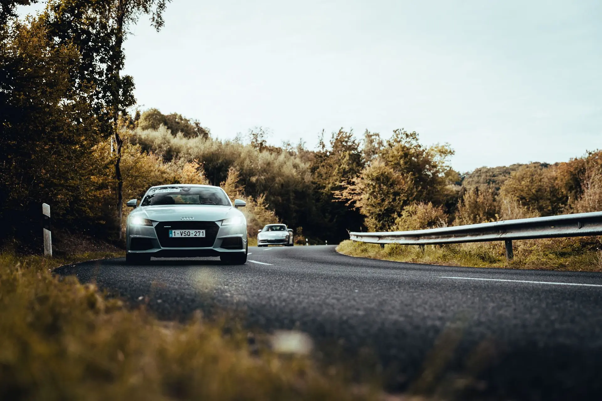 Audi TT coupé driving down country road