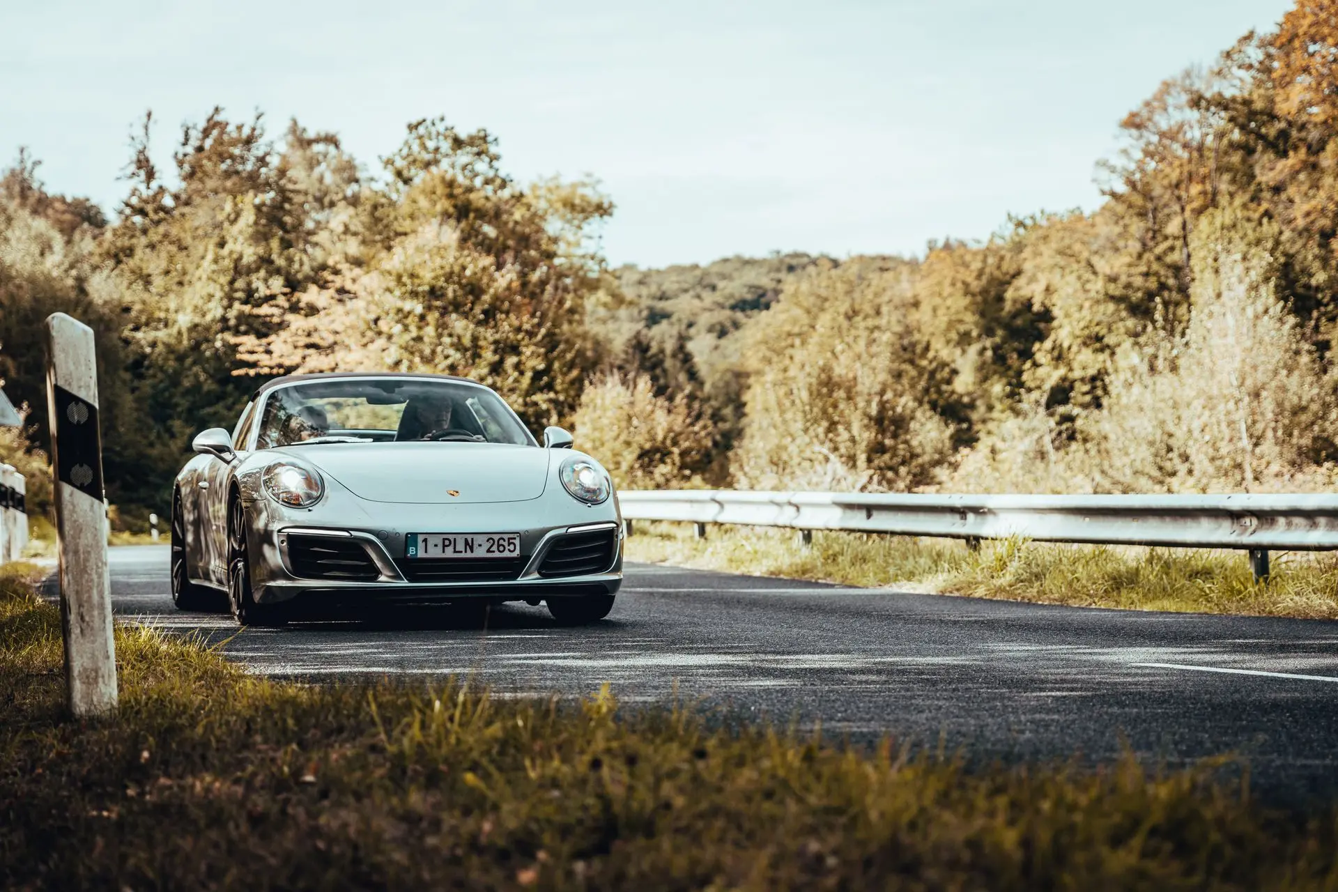 Gray Porsche 911 convertible