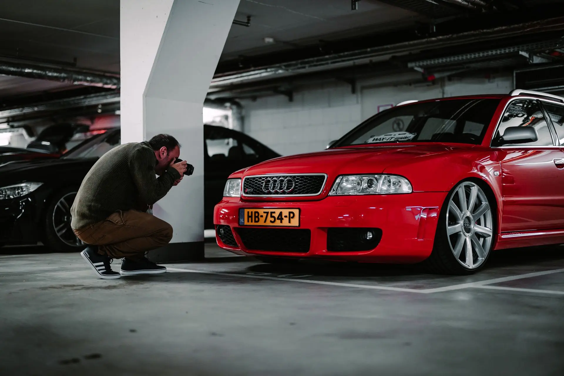Man photographing Classic Audi RS4