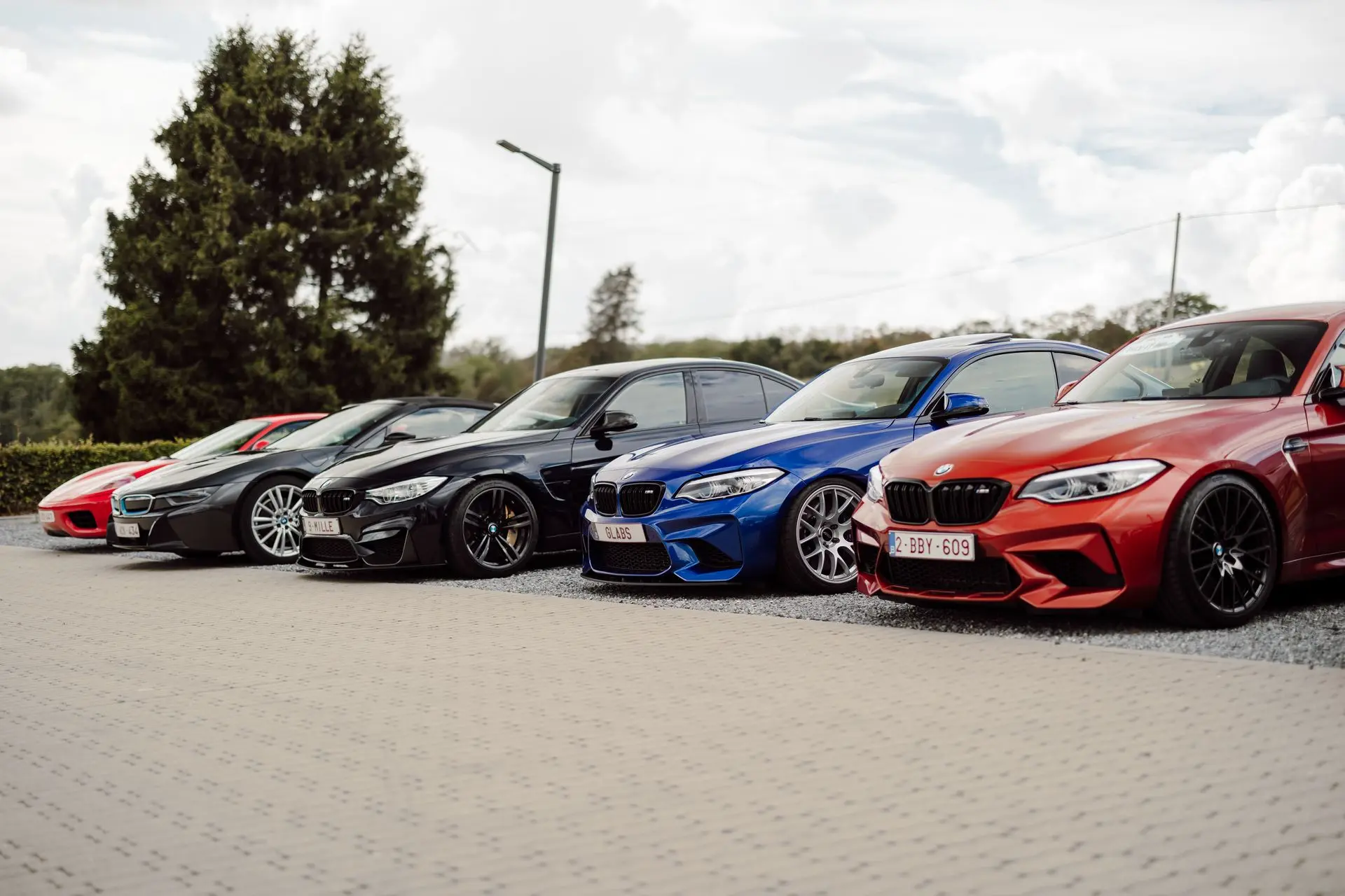 Sports cars parked up in parking